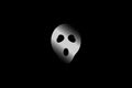 White ghost face mask on black background Ã¢â¬â scary Halloween Wallpaper Royalty Free Stock Photo